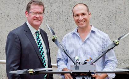 The Honourable Dr John McVeigh, MP Minister for Agriculture, Fisheries and Forestry; and Armando Navas, e-Gatton Project Officer with the hexacopter used to teach agriculture at UQ Gatton. 